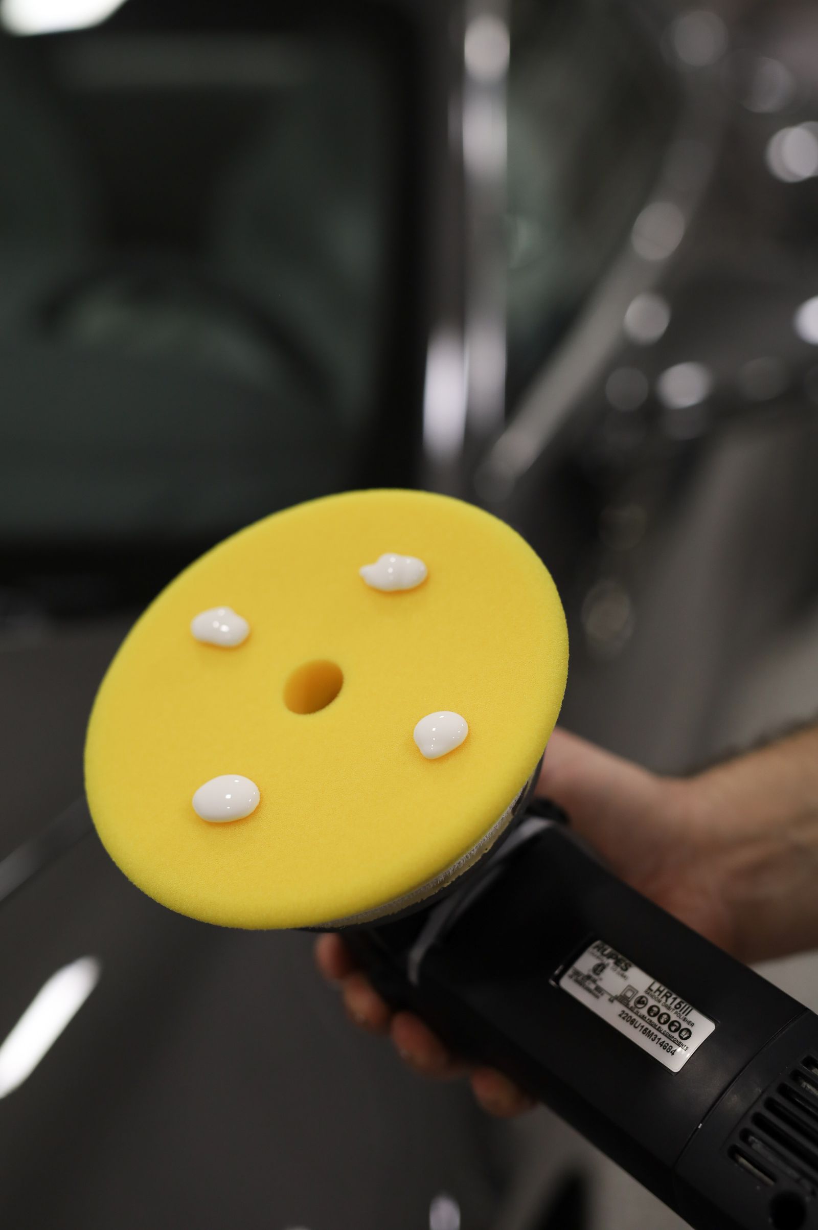 Paint polishing pad prepared for a professional finish